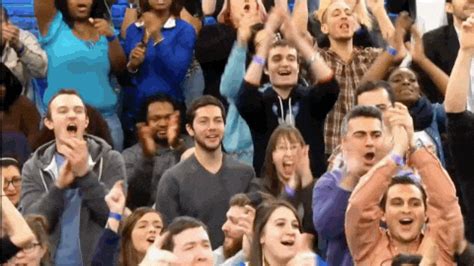 crowd cheering gif|crowd laughing gif.